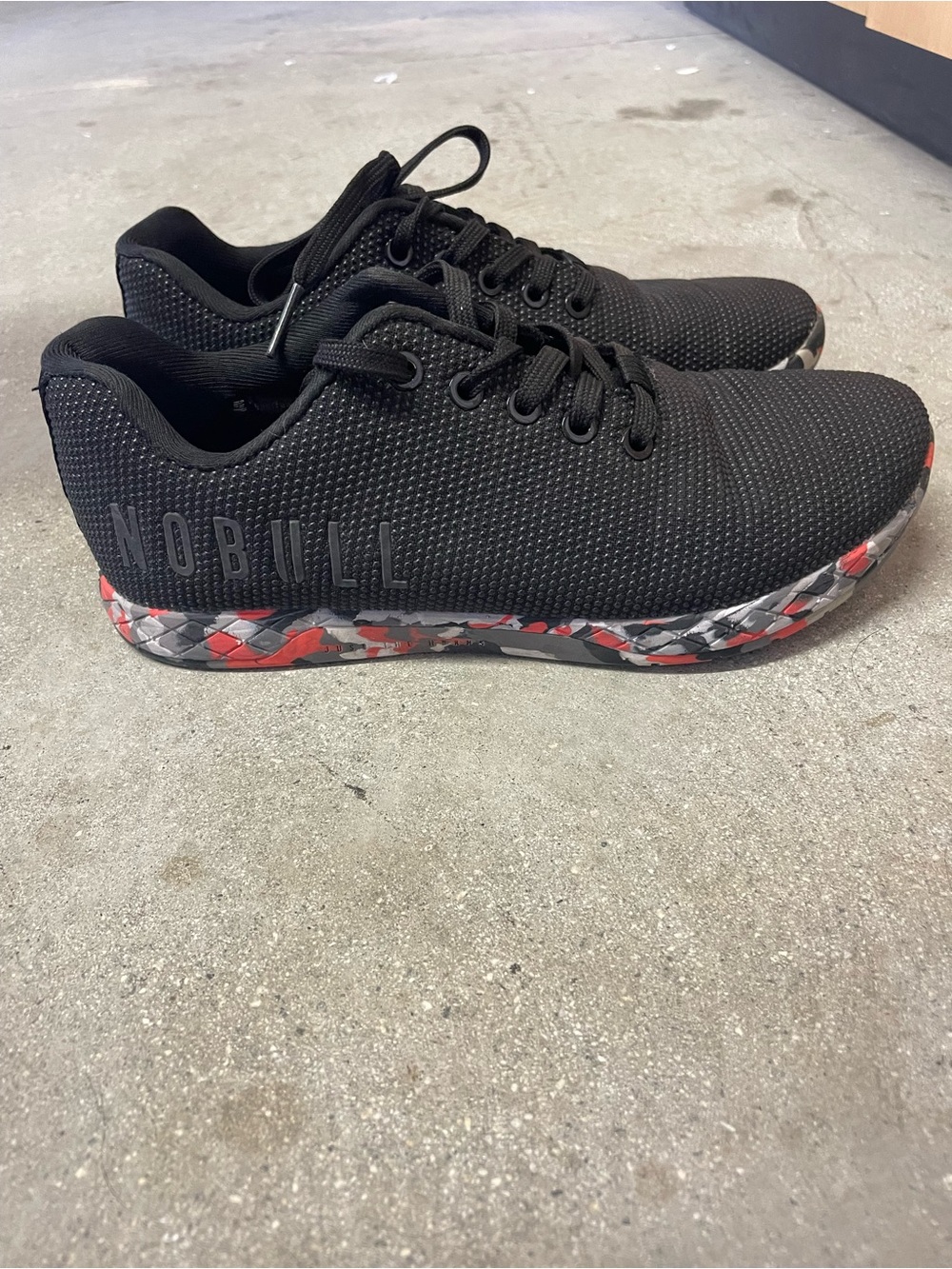 NOBULL Black Trainer with Red and Gray Camo Sole